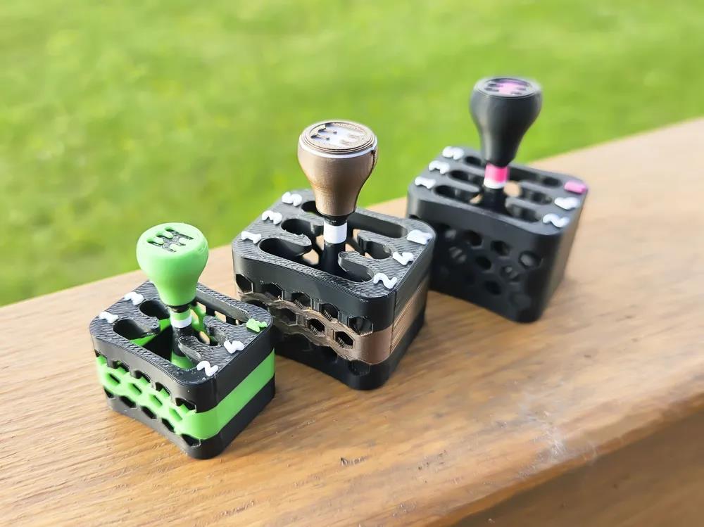 Cubo de câmbio manual fidget impresso em 3D