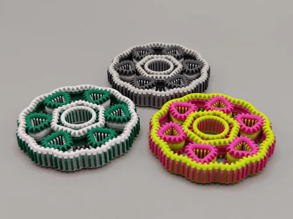 Disco giratório com engrenagens fidget impresso em 3D