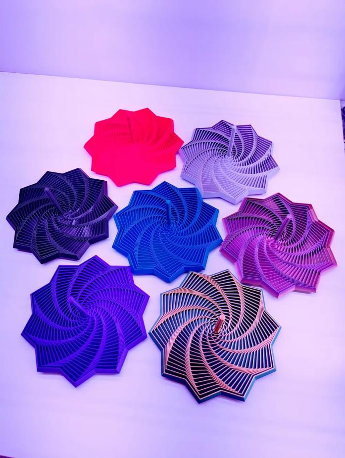 Disco espiralado estrela de 10 pontas fidget impresso em 3D